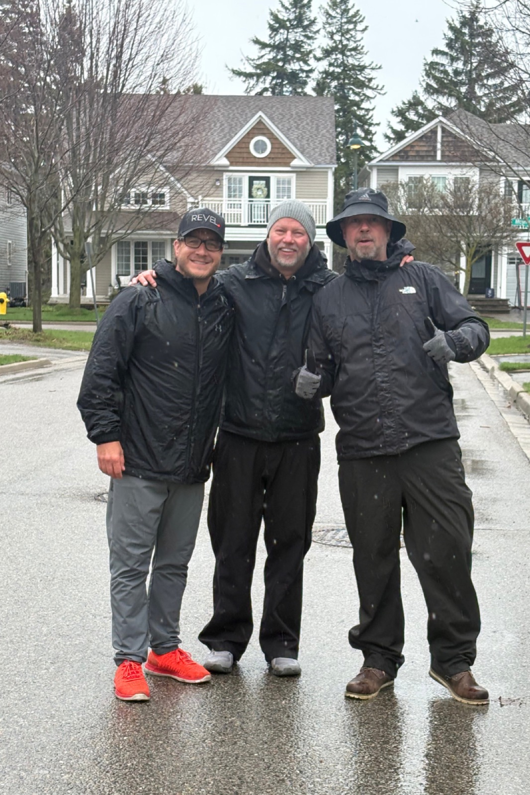 Dan Gregoire, Doug Gordon and Rich Gordon delivering donation bags for the Revel Realty Feed the Need Durham food drive