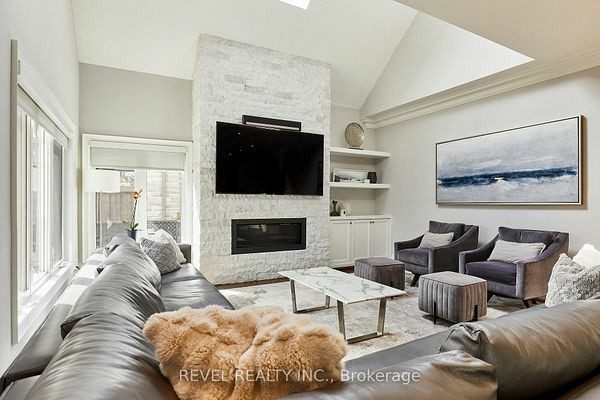 Family room with a floor-to-ceiling fireplace at 475 Poplar Avenue, Ajax